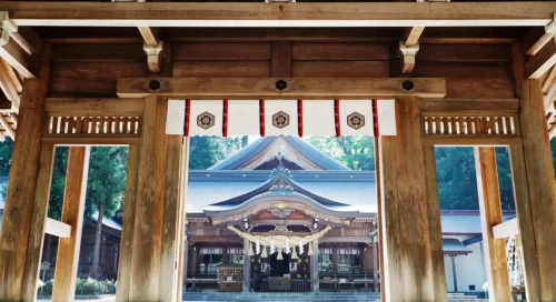 Tranquil Shinto shrine set amidst nature.
