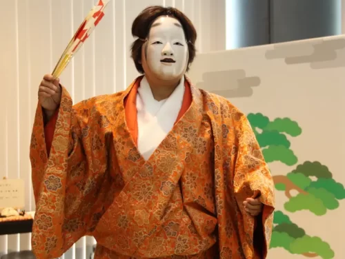 Experience traditional Noh theater attire.
