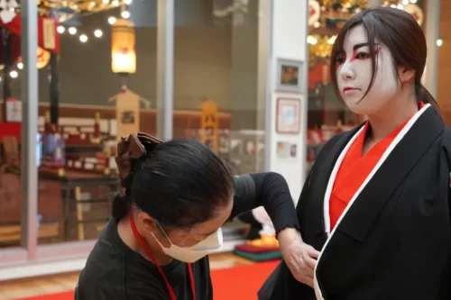 Experience traditional Noh theater attire.