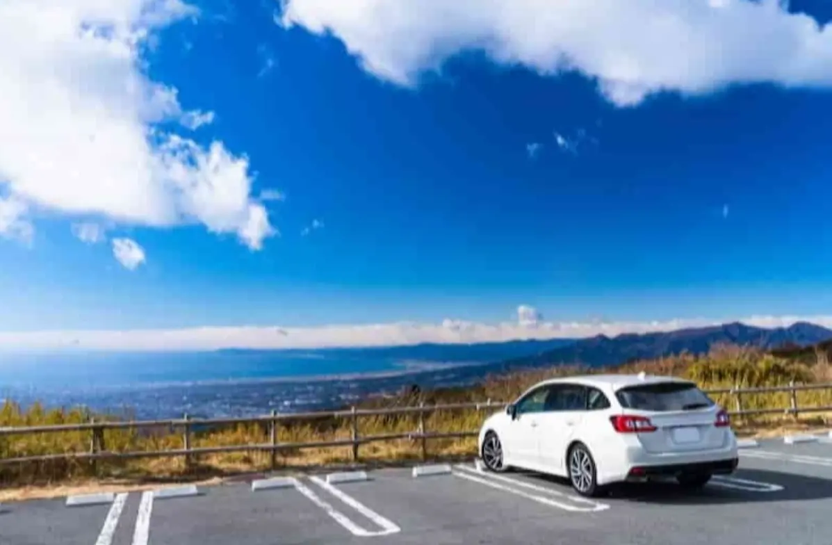 Travelers enjoying panoramic views on a private tour in the Hida region