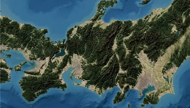Relief map of the Japanese archipelago showing steep mountain ranges, narrow coastal plains, and the fragmented island geography surrounded by ocean.